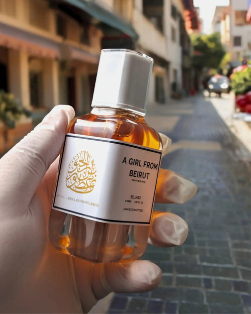 100ml amber glass parfum spray bottle of A Girl From Beirut by Ibn Al Jebouri, featuring a 40% oil concentration.